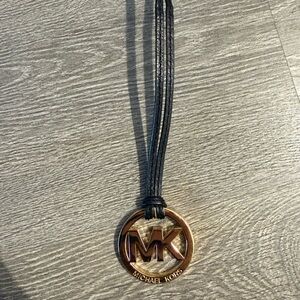 Michael Kors Black Leather Multi-Strand Bag Emblem with Brass MK Disc